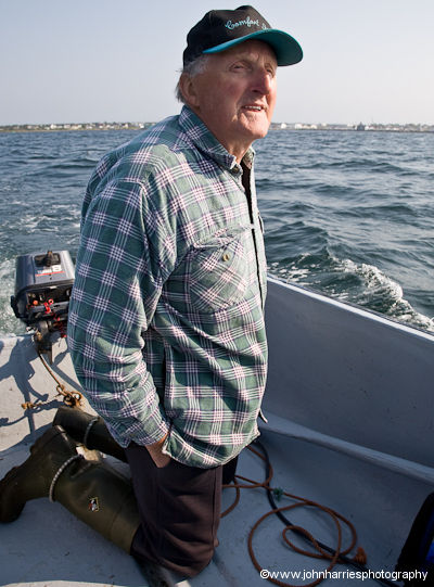 A retired Nova Scotia fisherman drives a speedboat through the torturous channels behind Cape Sable Island