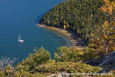 Aluminum sailboat Morgan's Cloud at anchor in Valley Cove, Somes Sound, Mount Desert Island, Maine in October