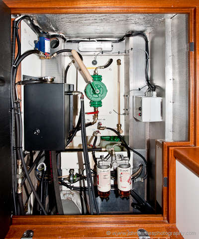 The diesel fuel day tank and other mechanical gear on Polaris, an aluminum expedition sailboat
