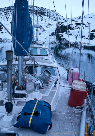 The deck of S/V Polaris, an aluminum expedition sailboat, in her winter berth near Aasiaat, Disko Bay, Greenland