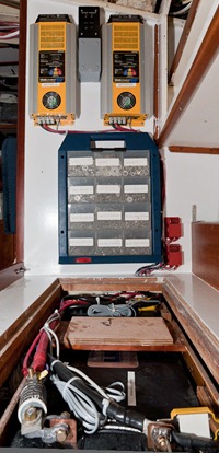 Xantrex TrueChargers installed above battery bank on expedition sailboat Morgan's Cloud JHH5-12213