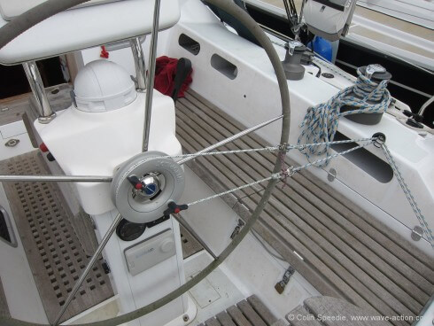 There has to be some form of ‘fail safe’ sacrificial element in the drive train, that will break and so prevent damage to the gear if it becomes overloaded. Some gears use a sacrificial thin wall tube (always carry at least one spare) between the gear and the rudder that will shear in the event of impact or overload – but remember to always attach a line to the rudder! Attaching the control line double block on the coaming with light line (4mm) worked too well for us (due to chafe) so now we simply don’t overtighten the locking wingnuts on the wheel drum – if the gear becomes overloaded, this allows the drum to slip and so instantly de-powers the gear, avoiding any damage.