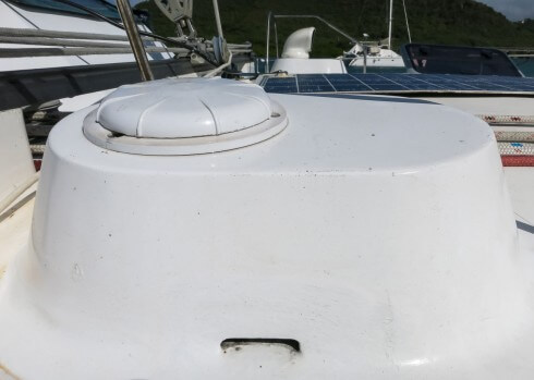 Storm cap on dorade box with vented dorade with protective cage in background Storm cap on dorade vent – make sure they’re properly fitted – and you know where they are stowed in advance